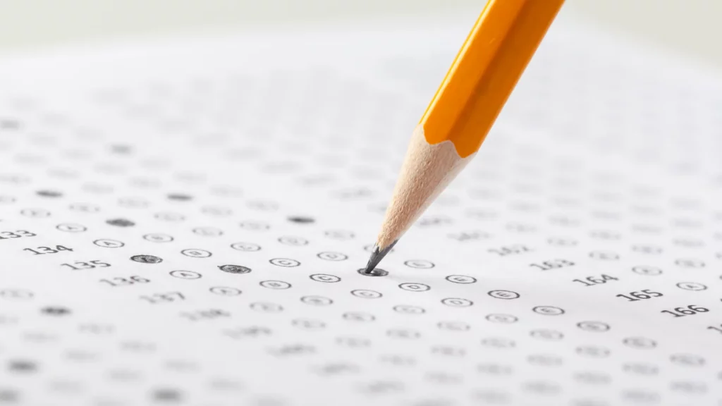 pencil filling in scantron bubbles