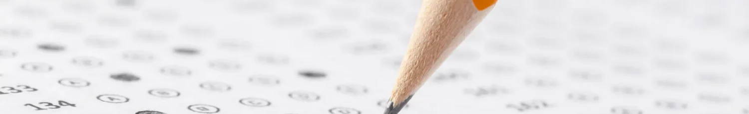 pencil filling in scantron bubbles
